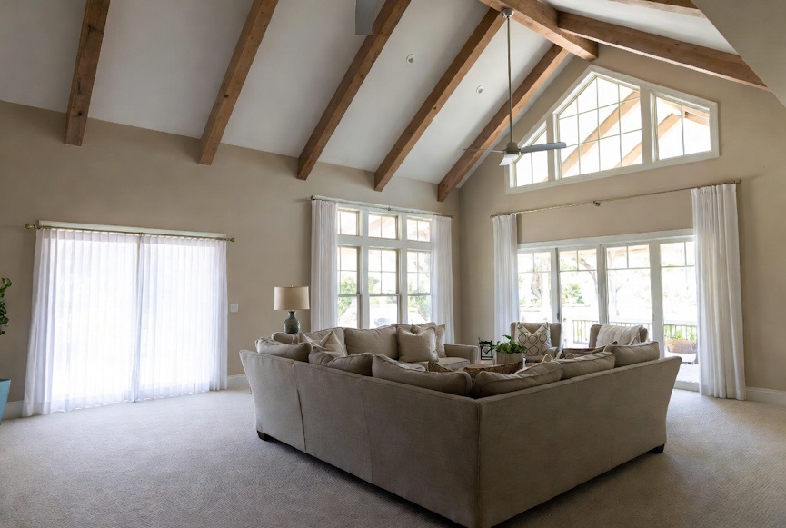 Bright and spacious living room with a modern sectional sofa in a Baton Rouge home