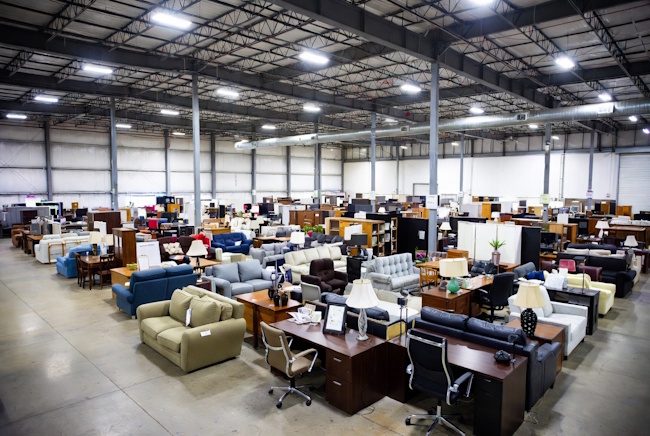 Clearance and lightly used furniture outlet with sofas, desks, tables, and décor