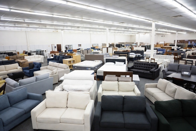 Affordable furniture showroom with sectionals, bedroom sets, mattresses, and payment options