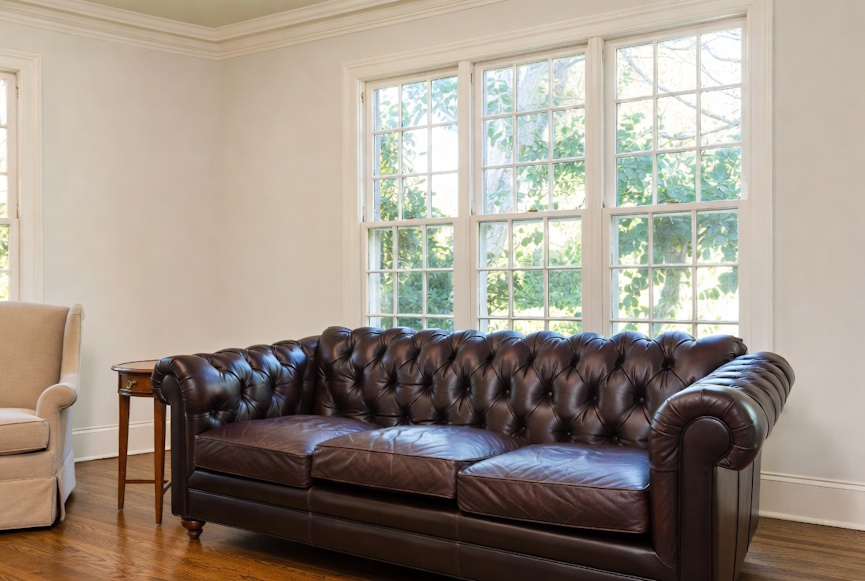 Elegant leather sofa in a traditional style living room