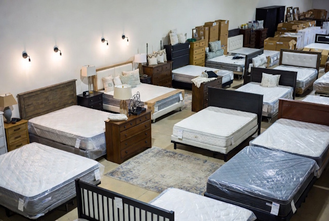Local furniture showroom with mattress sets and bedroom furniture