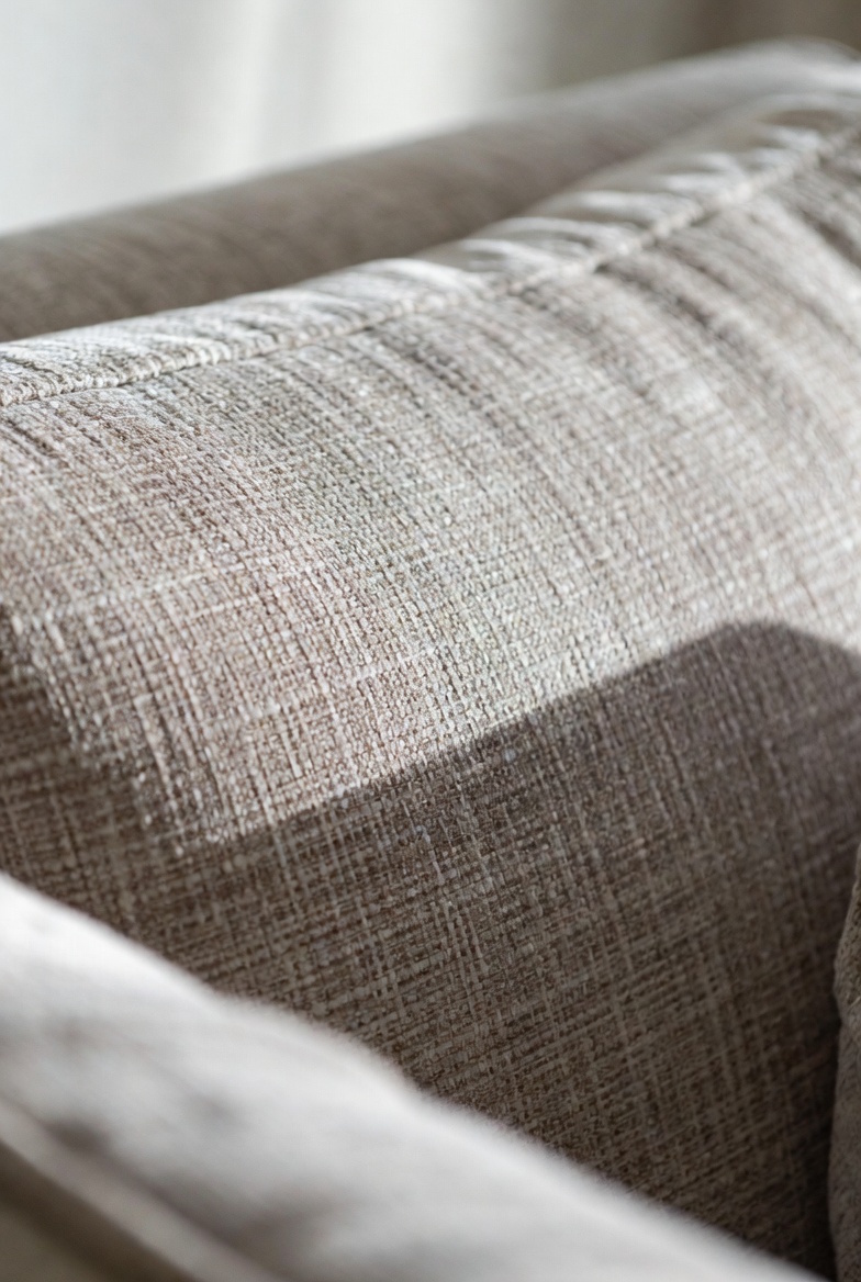 Close-up detail of performance fabric texture on a sofa