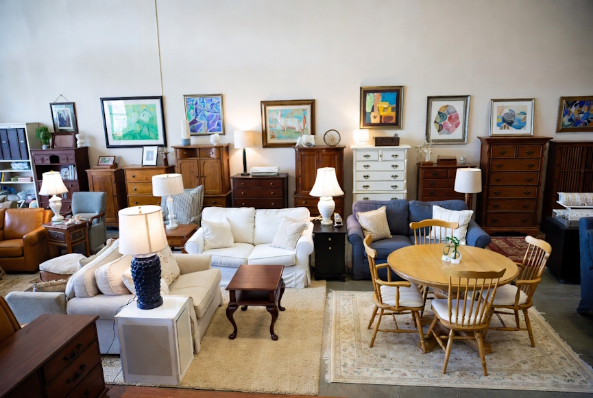 Used furniture showroom with sofas, dining tables, chairs, and home décor in Baton Rouge